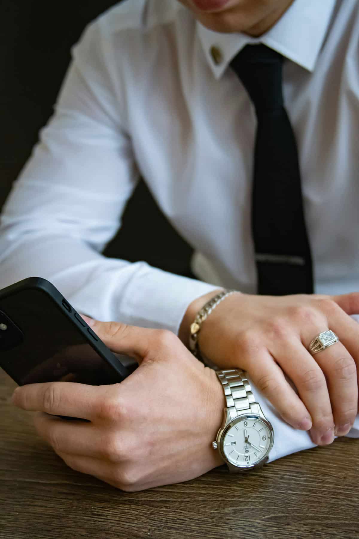 Close-up of a man holding a smartphone in hand