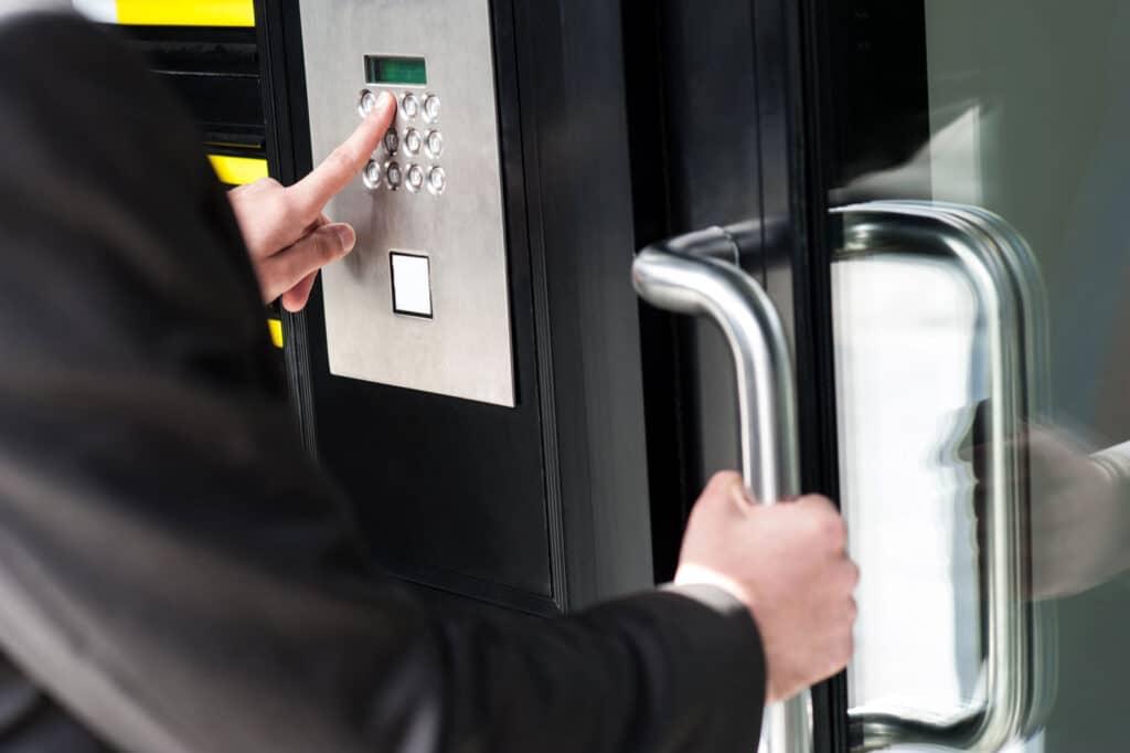 Pro-TechT keypad access control on commercial building door.