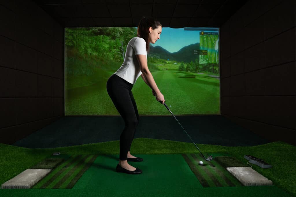 Pro-TechT virtual golf room with immersive screen display.