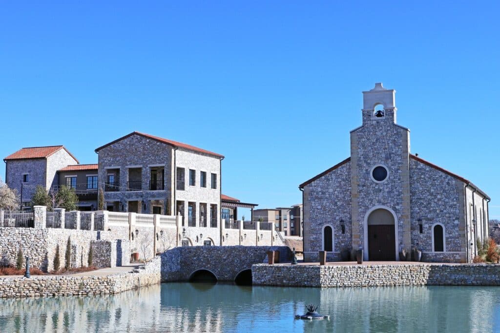 Church located by the river, surrounded by peaceful nature