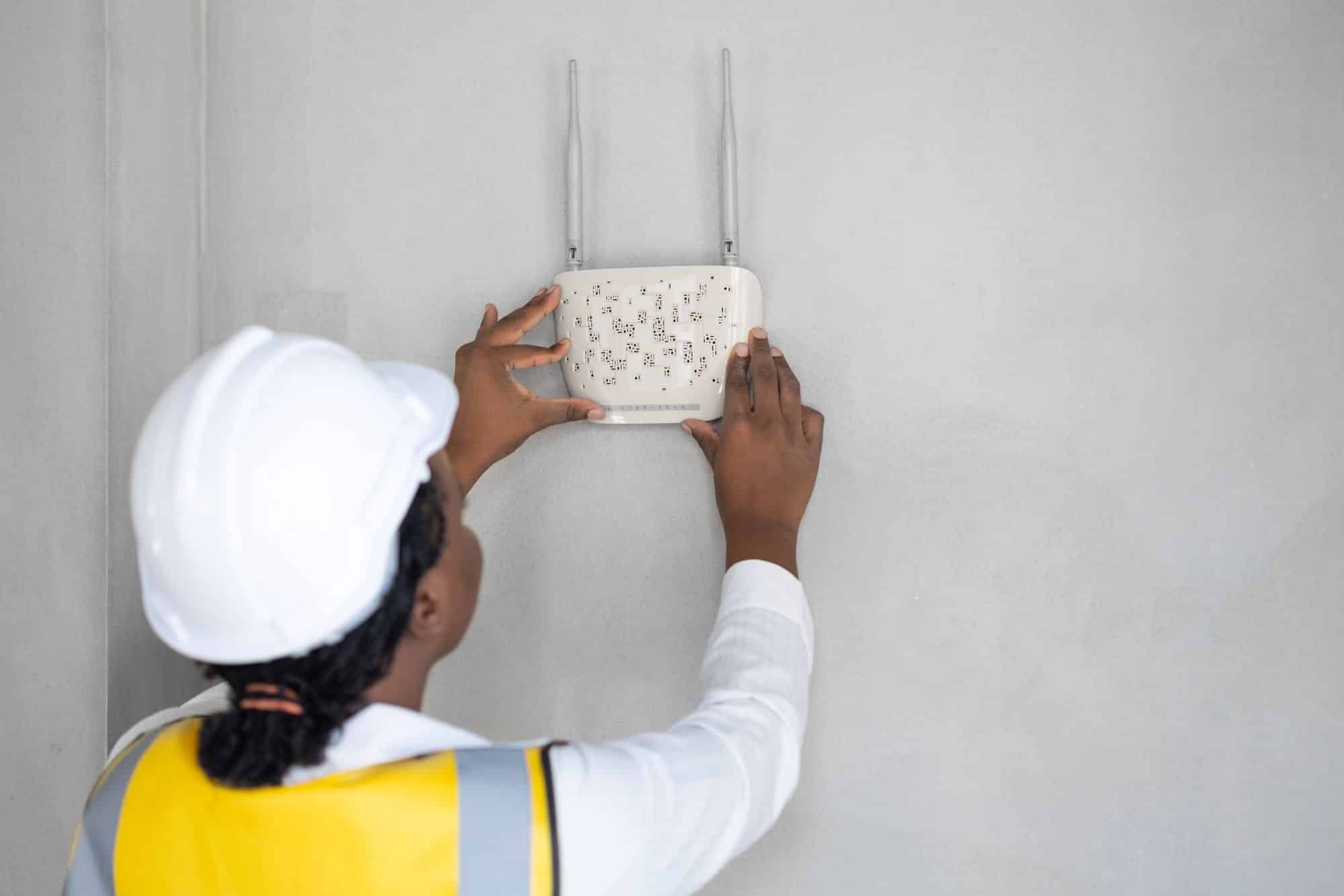 person doing home network installation
