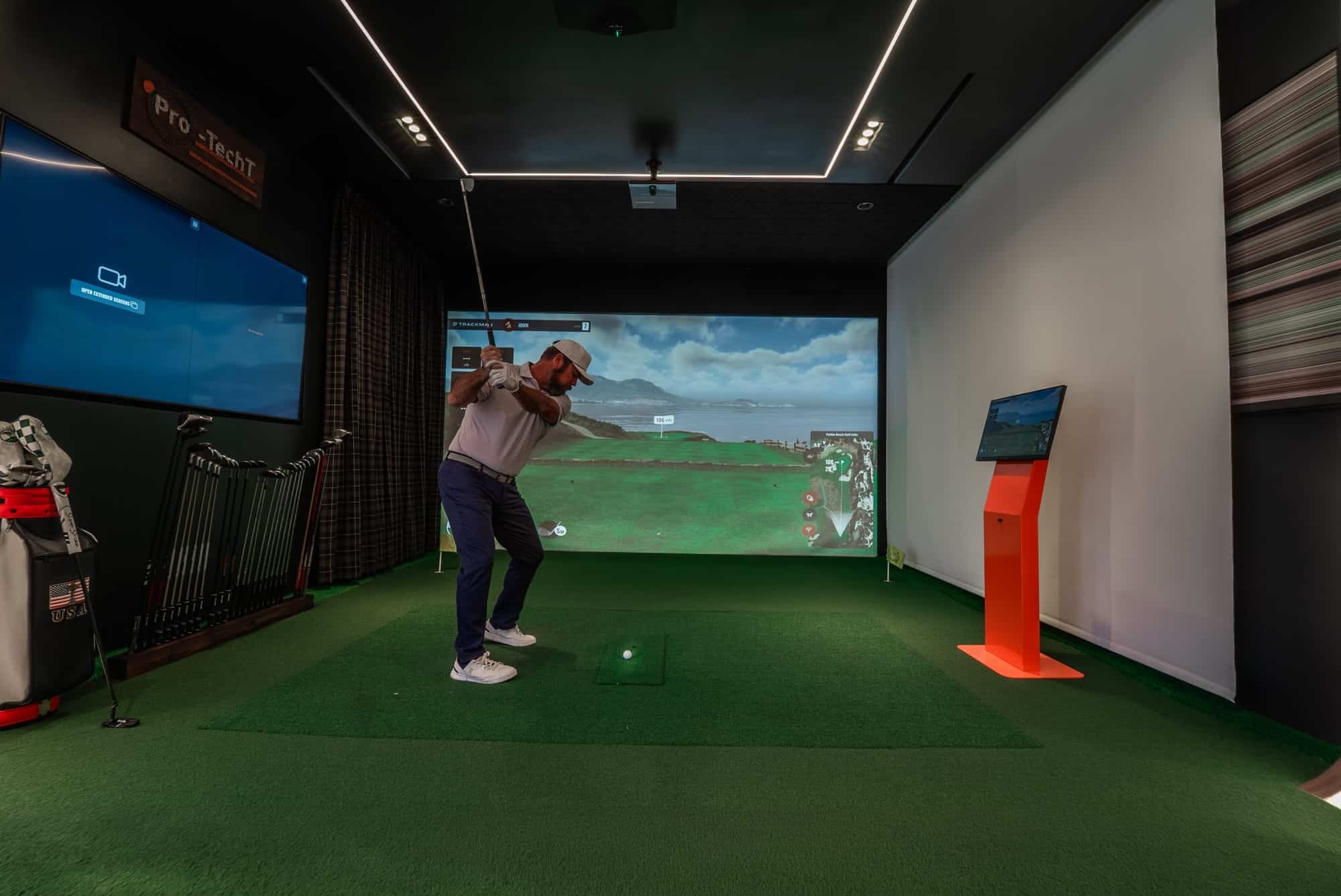 John Practicing Golf Using Pro-TechT Golf Simulator (1)