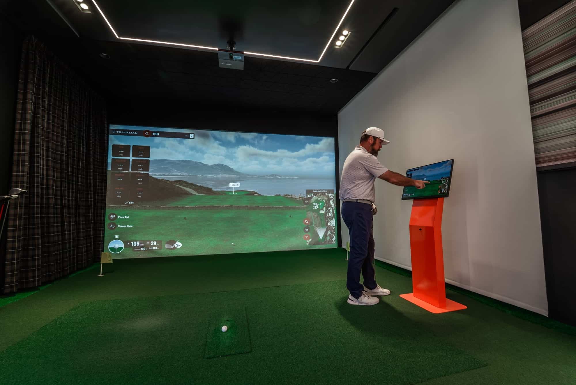 John checking Pro-TechT's Golf Simulator Screen (1) (1)