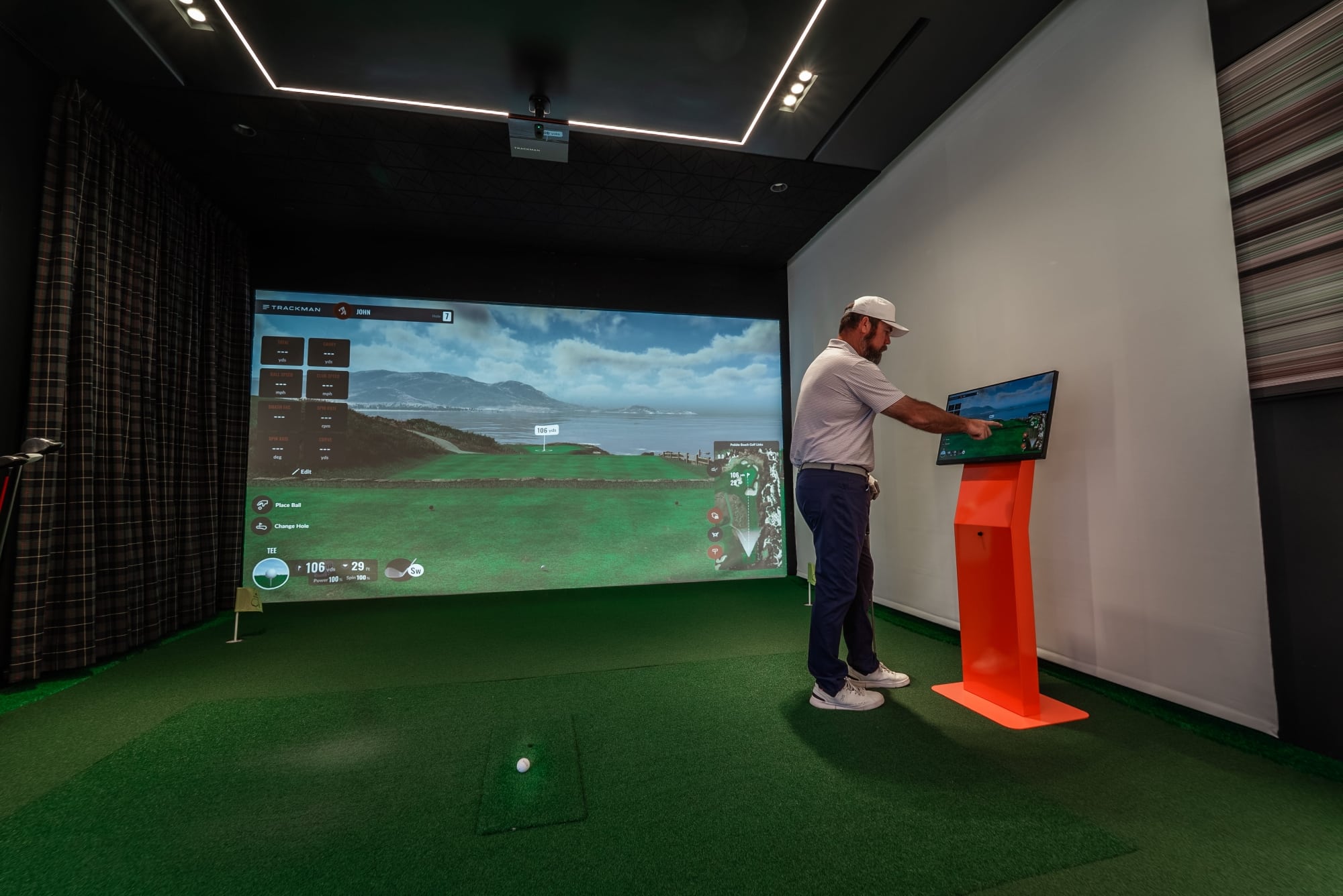John checking Pro-TechT's Golf Simulator Screen (1)